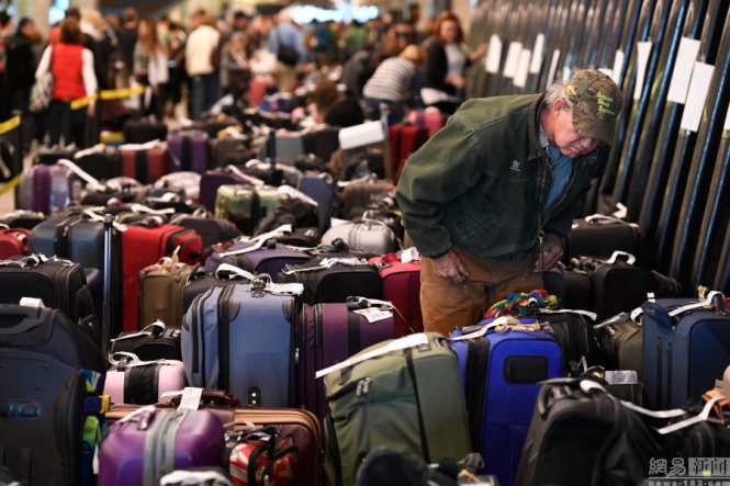 United States great Blizzard delayed baggage caused by airport baggage piled