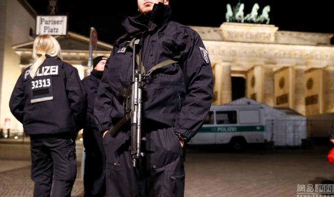 Germany police stationed at the Brandenburg Gate to ensure security during the new year